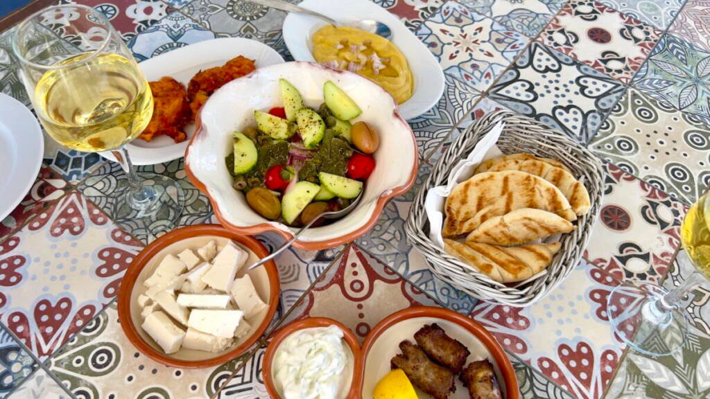 Traditional Greek dishes in Akrotiri by Faros Santorini